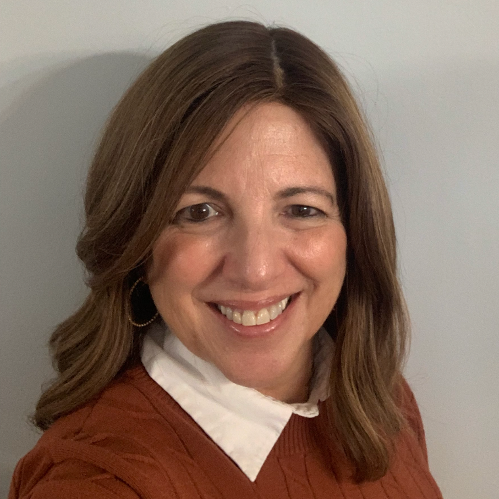 Headshot of Lisa Ehrlich smiling.