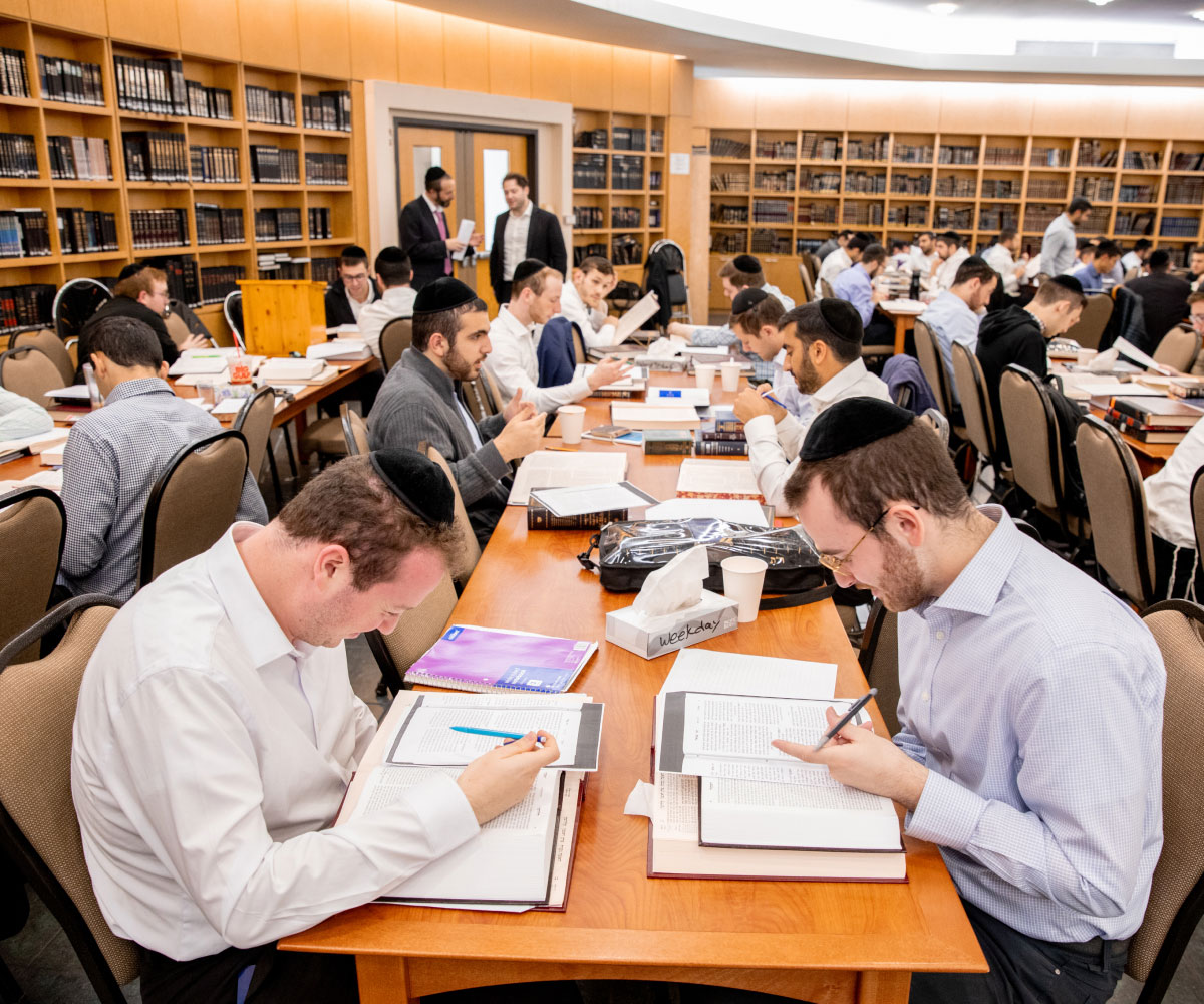 Beis Medrash students reading at table